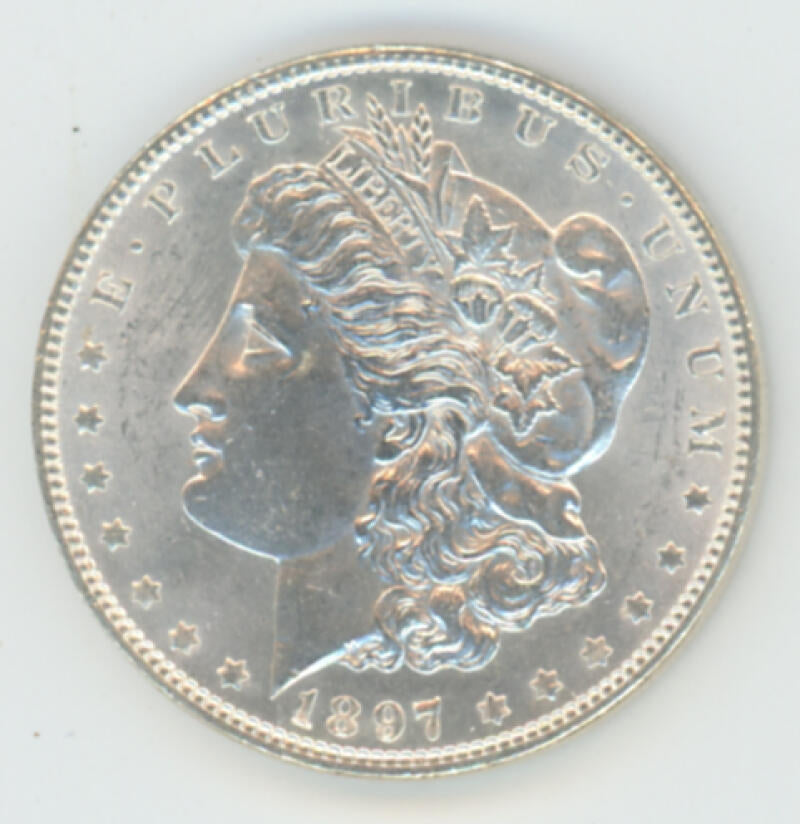 1897 O Morgan Silver Dollar. RAW Image 1